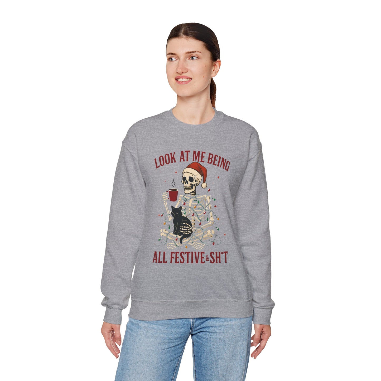 gray Christmas sweatshirt showing skeleton-in-lights artwork with cheeky text, relaxed unisex cut in flat product mockup