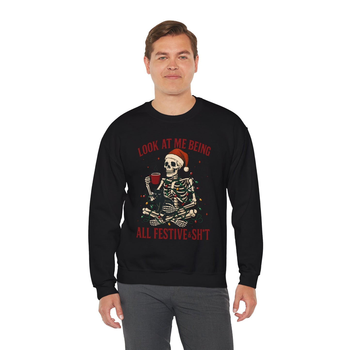 Black Christmas sweatshirt showing skeleton-in-lights artwork with cheeky text, relaxed unisex cut in flat product mockup