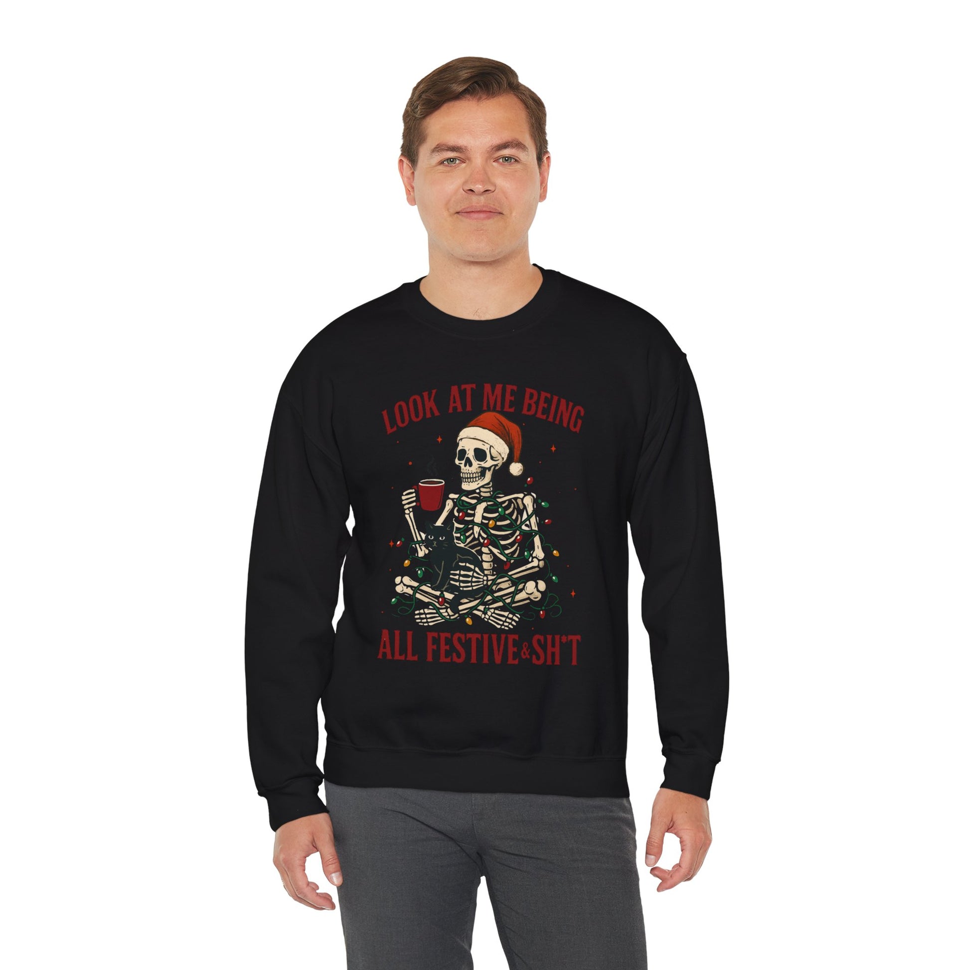 Black Christmas sweatshirt showing skeleton-in-lights artwork with cheeky text, relaxed unisex cut in flat product mockup