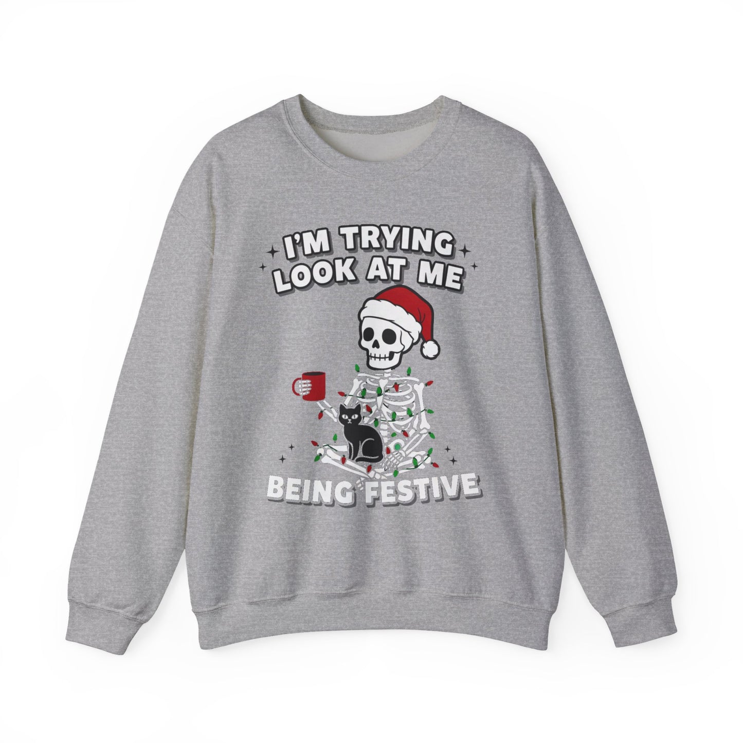 gray Christmas sweatshirt with bold skeleton graphic and cheeky phrase, relaxed unisex cut shown in flat-lay mockup