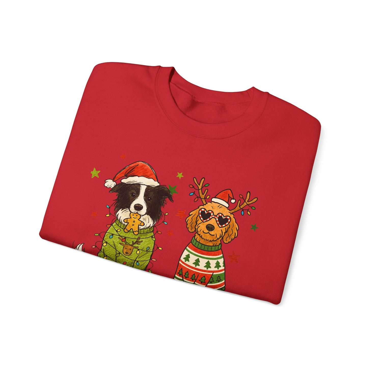 Red fleece crew with two-dog holiday illustration, relaxed unisex fit shown flat on a clean product backdrop