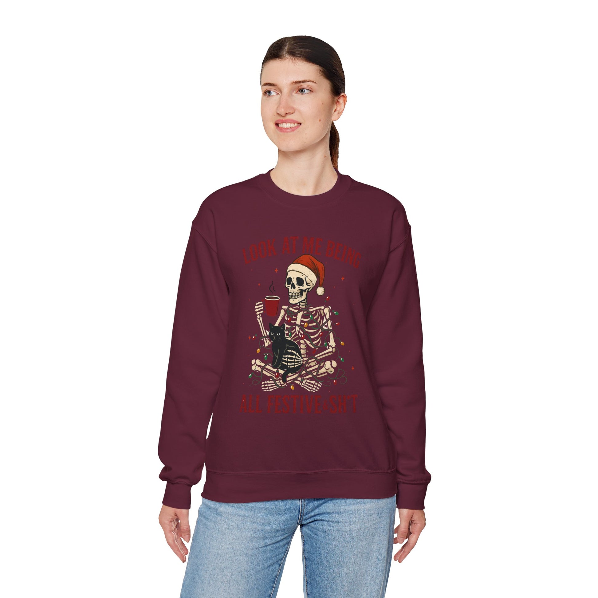 maroon unisex sweatshirt featuring skeleton wrapped in lights, crisp front print shown flat on clean background