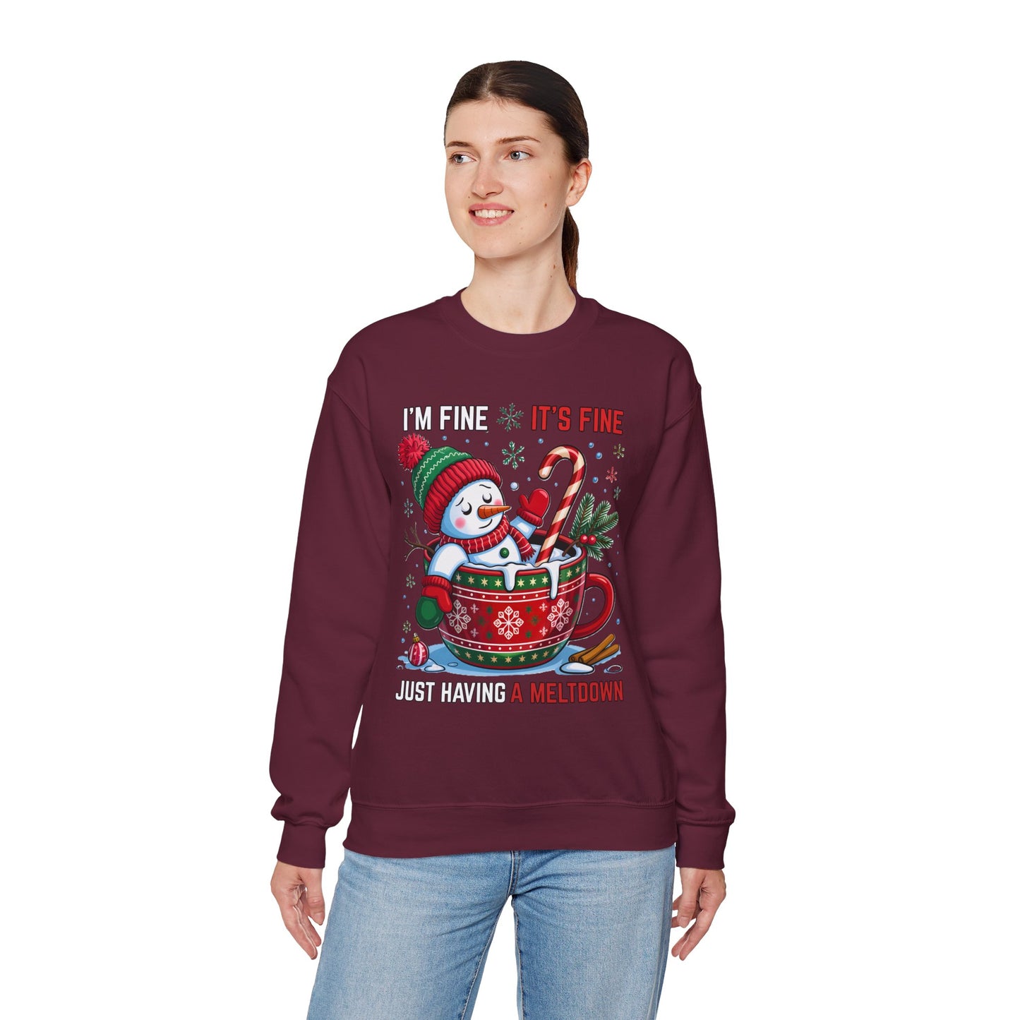 maroon fleece crew with bold typography and Santa-in-mug illustration, relaxed unisex cut shown flat on clean backdrop