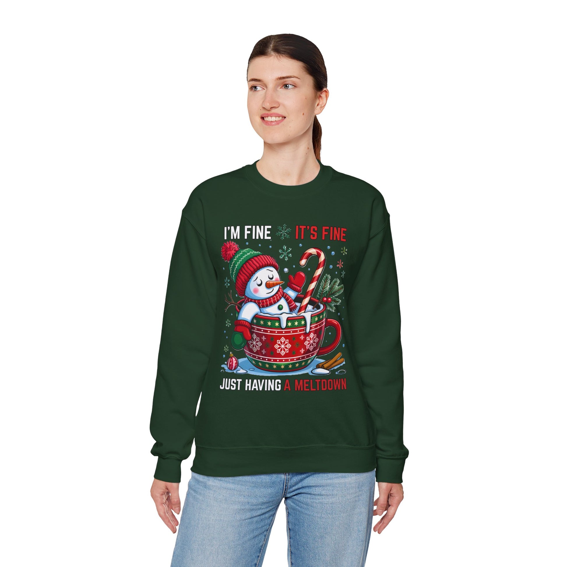 green sweatshirt showing Santa in a red mug with candy cane and humor phrase, centered chest graphic, studio mockup